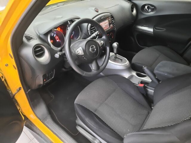 Желтый Ниссан Жук, объемом двигателя 1.6 л и пробегом 125 тыс. км за 9700 $, фото 15 на Automoto.ua