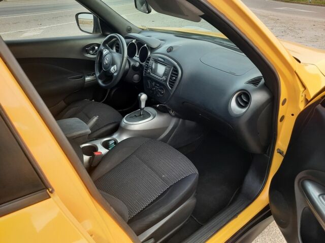 Желтый Ниссан Жук, объемом двигателя 1.6 л и пробегом 125 тыс. км за 9700 $, фото 9 на Automoto.ua