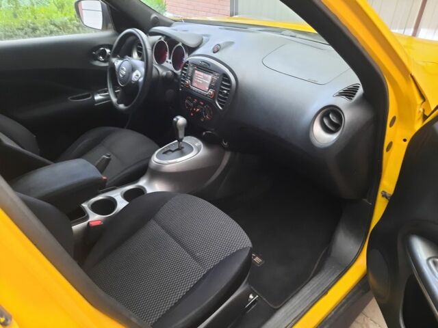 Желтый Ниссан Жук, объемом двигателя 1.6 л и пробегом 125 тыс. км за 9700 $, фото 17 на Automoto.ua