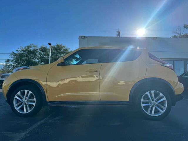 Желтый Ниссан Жук, объемом двигателя 1.6 л и пробегом 78 тыс. км за 8540 $, фото 3 на Automoto.ua