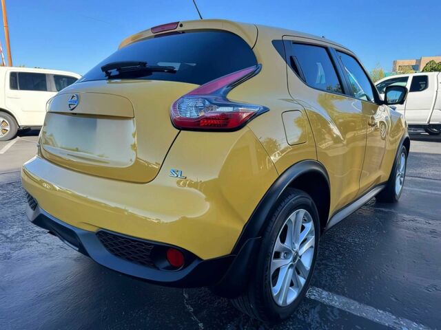 Желтый Ниссан Жук, объемом двигателя 1.6 л и пробегом 78 тыс. км за 8540 $, фото 4 на Automoto.ua