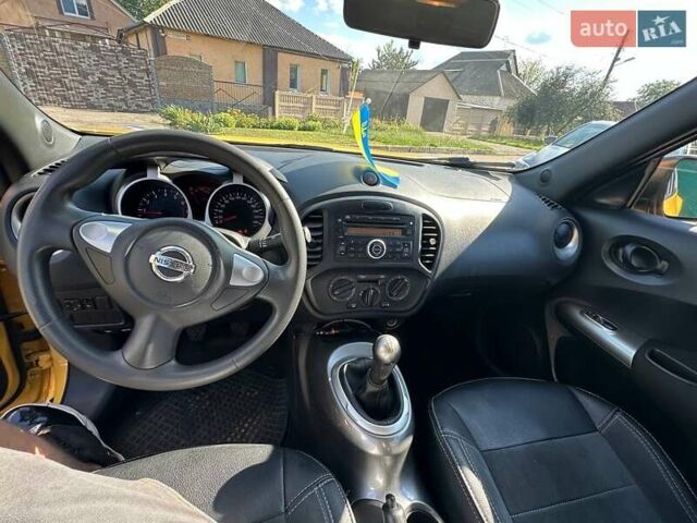 Желтый Ниссан Жук, объемом двигателя 1.6 л и пробегом 43 тыс. км за 12800 $, фото 7 на Automoto.ua