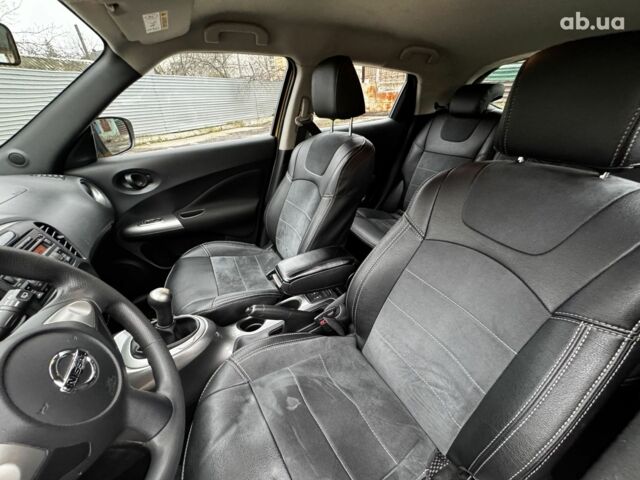 Желтый Ниссан Жук, объемом двигателя 1.6 л и пробегом 43 тыс. км за 12790 $, фото 17 на Automoto.ua