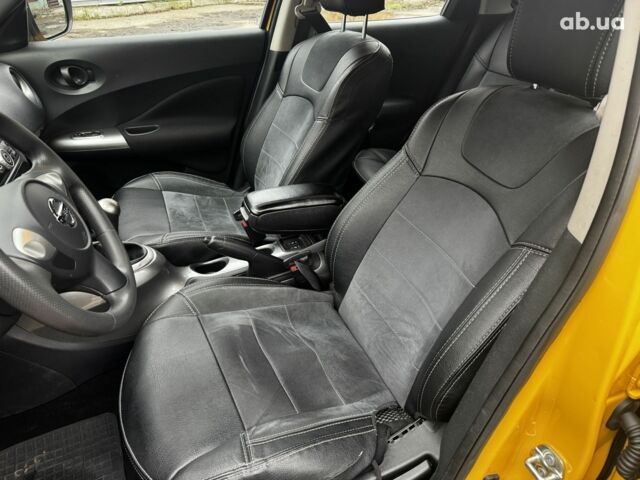 Желтый Ниссан Жук, объемом двигателя 1.6 л и пробегом 43 тыс. км за 12790 $, фото 11 на Automoto.ua