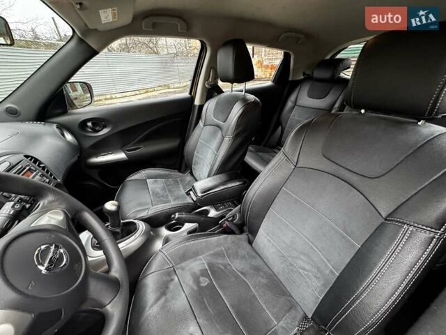 Желтый Ниссан Жук, объемом двигателя 1.6 л и пробегом 43 тыс. км за 12790 $, фото 12 на Automoto.ua