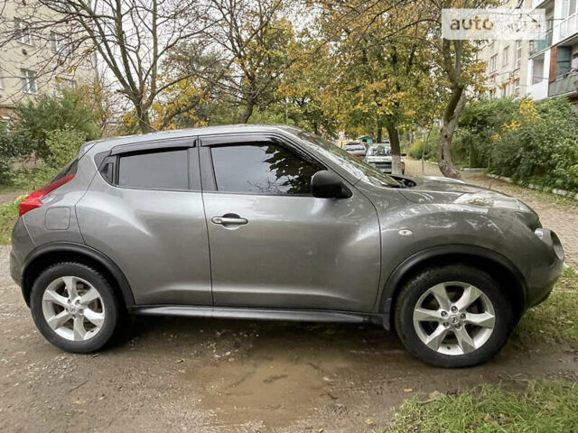 Сірий Ніссан Жук, об'ємом двигуна 1.46 л та пробігом 251 тис. км за 8300 $, фото 2 на Automoto.ua