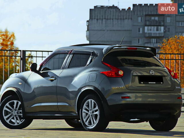 Серый Ниссан Жук, объемом двигателя 1.6 л и пробегом 57 тыс. км за 12300 $, фото 5 на Automoto.ua