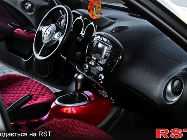 Серый Ниссан Жук, объемом двигателя 1.6 л и пробегом 57 тыс. км за 12300 $, фото 11 на Automoto.ua