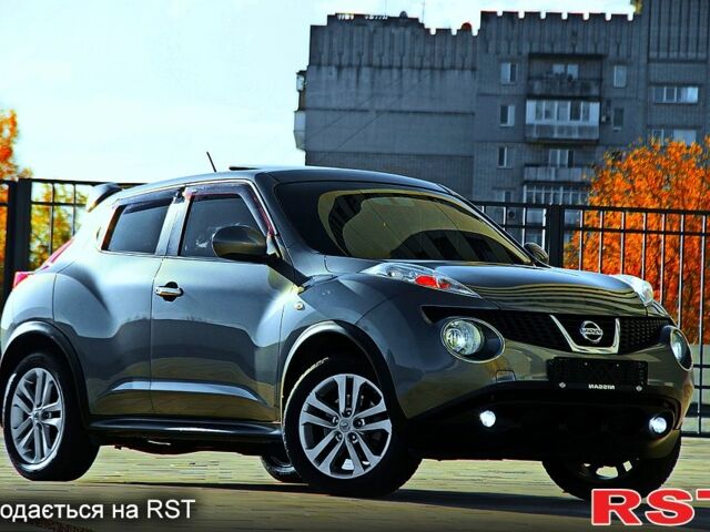 Серый Ниссан Жук, объемом двигателя 1.6 л и пробегом 57 тыс. км за 12300 $, фото 4 на Automoto.ua