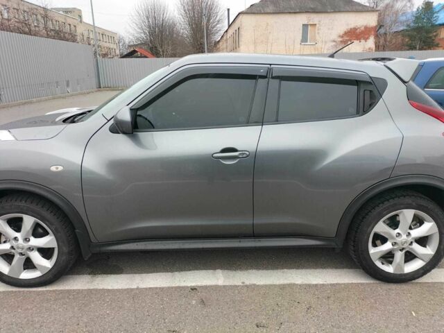 Сірий Ніссан Жук, об'ємом двигуна 1.6 л та пробігом 148 тис. км за 11711 $, фото 1 на Automoto.ua