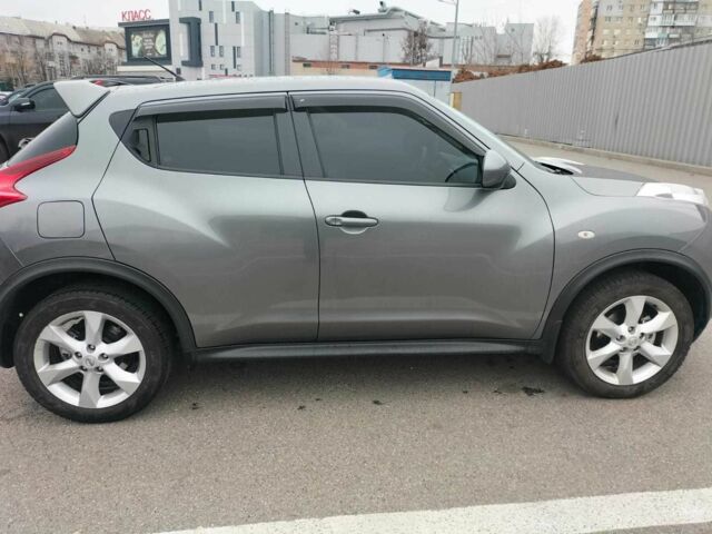 Сірий Ніссан Жук, об'ємом двигуна 1.6 л та пробігом 148 тис. км за 11711 $, фото 4 на Automoto.ua