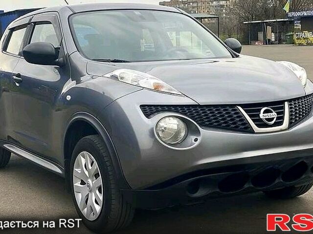 Серый Ниссан Жук, объемом двигателя 1.6 л и пробегом 139 тыс. км за 8900 $, фото 6 на Automoto.ua