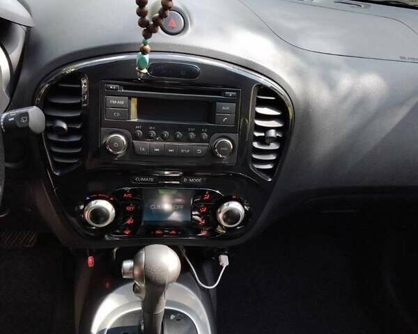 Сірий Ніссан Жук, об'ємом двигуна 1.6 л та пробігом 95 тис. км за 10600 $, фото 18 на Automoto.ua