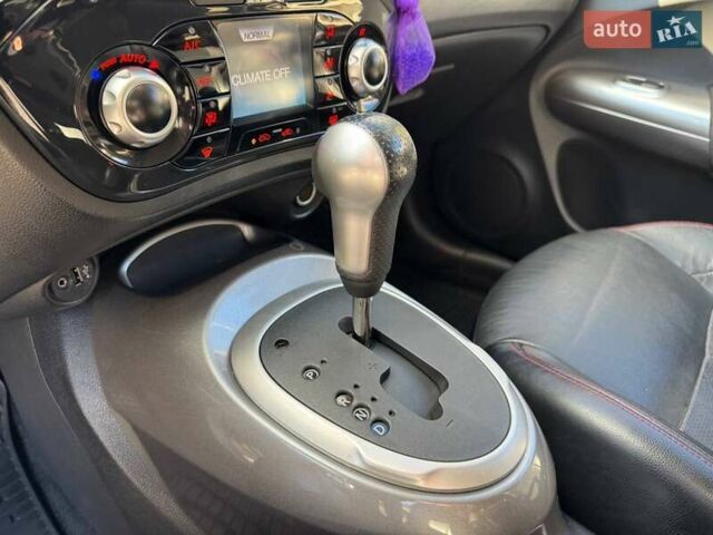 Сірий Ніссан Жук, об'ємом двигуна 1.6 л та пробігом 116 тис. км за 12000 $, фото 23 на Automoto.ua