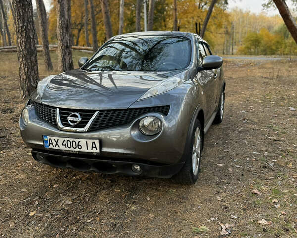 Серый Ниссан Жук, объемом двигателя 1.6 л и пробегом 165 тыс. км за 9900 $, фото 5 на Automoto.ua