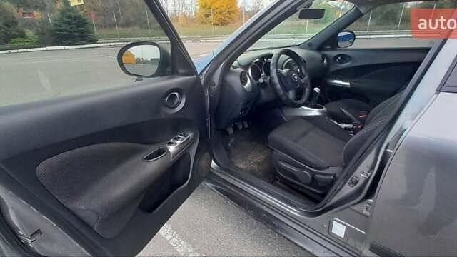 Серый Ниссан Жук, объемом двигателя 1.6 л и пробегом 146 тыс. км за 10200 $, фото 7 на Automoto.ua