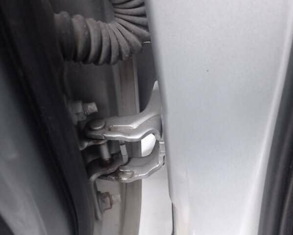 Сірий Ніссан Жук, об'ємом двигуна 1.62 л та пробігом 155 тис. км за 13500 $, фото 11 на Automoto.ua