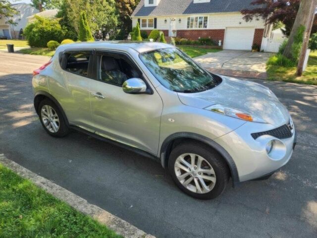 Серый Ниссан Жук, объемом двигателя 1.6 л и пробегом 84 тыс. км за 7500 $, фото 7 на Automoto.ua