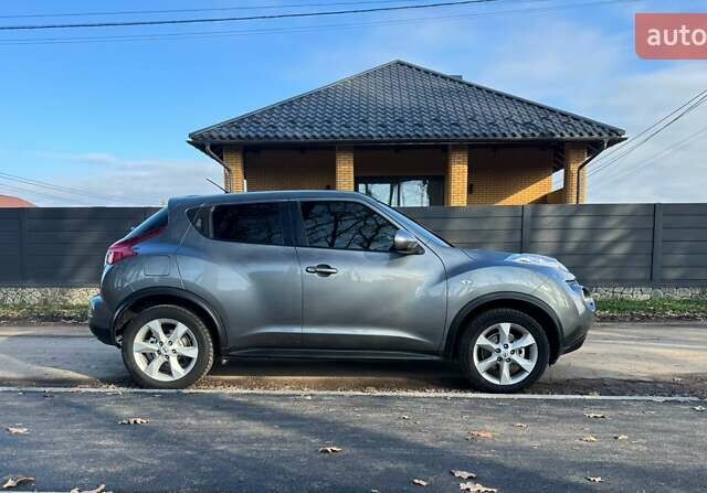 Сірий Ніссан Жук, об'ємом двигуна 1.6 л та пробігом 82 тис. км за 10700 $, фото 1 на Automoto.ua