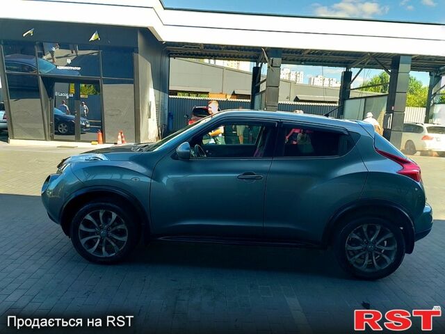 Сірий Ніссан Жук, об'ємом двигуна 1.6 л та пробігом 106 тис. км за 11000 $, фото 4 на Automoto.ua