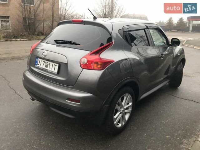 Серый Ниссан Жук, объемом двигателя 1.6 л и пробегом 93 тыс. км за 11300 $, фото 5 на Automoto.ua