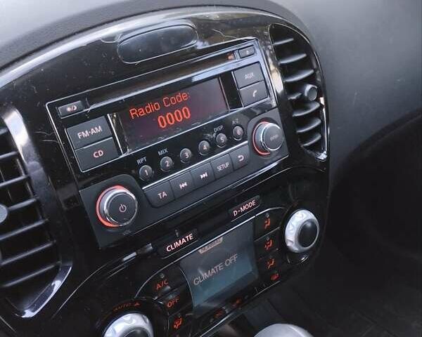 Сірий Ніссан Жук, об'ємом двигуна 1.6 л та пробігом 109 тис. км за 11950 $, фото 14 на Automoto.ua