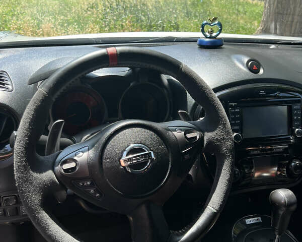 Сірий Ніссан Жук, об'ємом двигуна 1.62 л та пробігом 136 тис. км за 12800 $, фото 18 на Automoto.ua