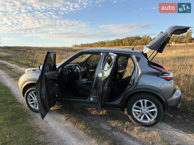 Серый Ниссан Жук, объемом двигателя 1.6 л и пробегом 100 тыс. км за 12500 $, фото 3 на Automoto.ua