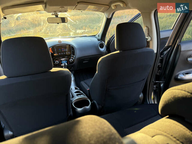 Серый Ниссан Жук, объемом двигателя 1.6 л и пробегом 100 тыс. км за 12500 $, фото 16 на Automoto.ua
