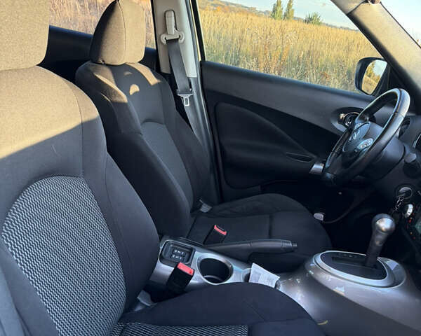 Серый Ниссан Жук, объемом двигателя 1.6 л и пробегом 100 тыс. км за 12500 $, фото 7 на Automoto.ua