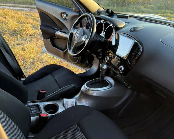 Серый Ниссан Жук, объемом двигателя 1.6 л и пробегом 100 тыс. км за 12500 $, фото 18 на Automoto.ua