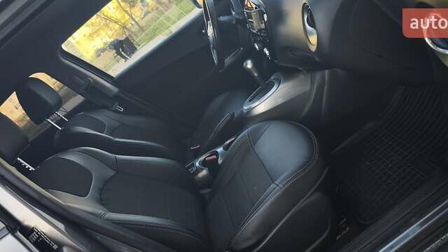 Сірий Ніссан Жук, об'ємом двигуна 1.6 л та пробігом 69 тис. км за 14000 $, фото 14 на Automoto.ua