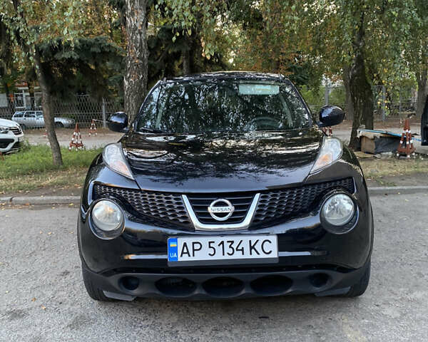 Синий Ниссан Жук, объемом двигателя 1.62 л и пробегом 185 тыс. км за 9500 $, фото 1 на Automoto.ua