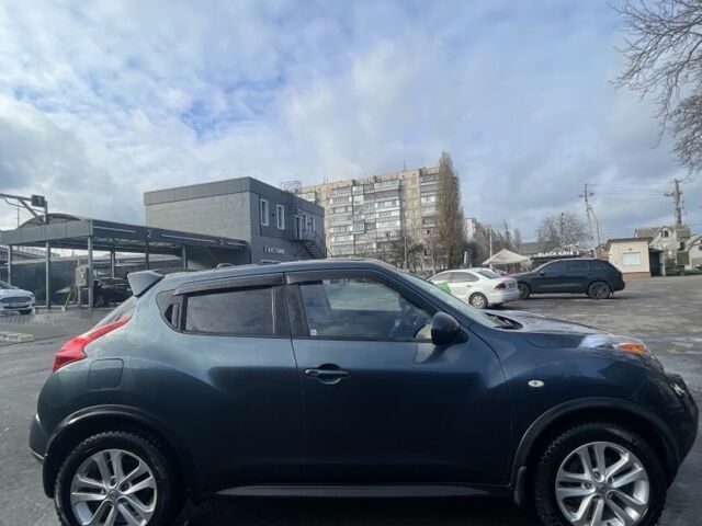 Синий Ниссан Жук, объемом двигателя 1.6 л и пробегом 132 тыс. км за 9800 $, фото 3 на Automoto.ua