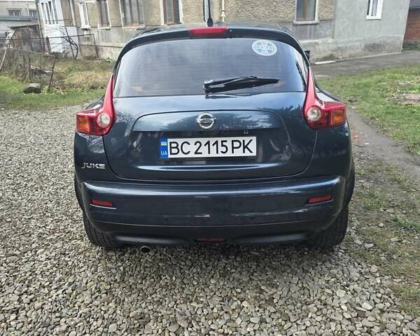 Синий Ниссан Жук, объемом двигателя 1.6 л и пробегом 120 тыс. км за 8000 $, фото 5 на Automoto.ua