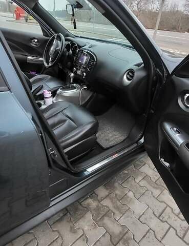 Синий Ниссан Жук, объемом двигателя 1.6 л и пробегом 216 тыс. км за 8900 $, фото 6 на Automoto.ua