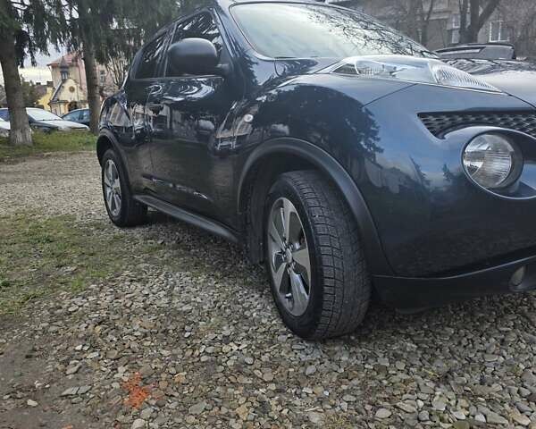 Синий Ниссан Жук, объемом двигателя 1.6 л и пробегом 120 тыс. км за 8000 $, фото 2 на Automoto.ua