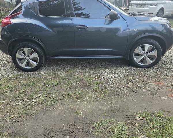 Синий Ниссан Жук, объемом двигателя 1.6 л и пробегом 120 тыс. км за 8000 $, фото 3 на Automoto.ua