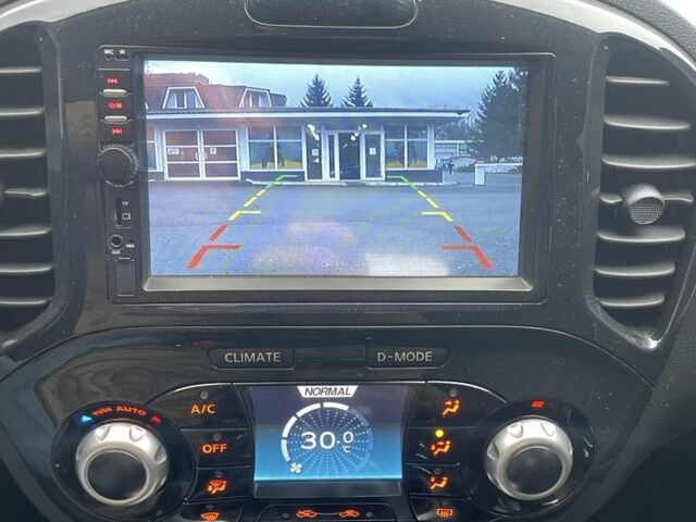 Синий Ниссан Жук, объемом двигателя 1.6 л и пробегом 65 тыс. км за 6250 $, фото 5 на Automoto.ua