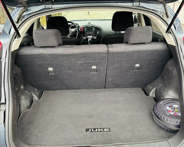 Синий Ниссан Жук, объемом двигателя 1.62 л и пробегом 99 тыс. км за 10800 $, фото 8 на Automoto.ua