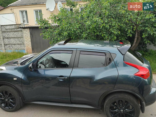 Синий Ниссан Жук, объемом двигателя 1.62 л и пробегом 148 тыс. км за 9700 $, фото 5 на Automoto.ua