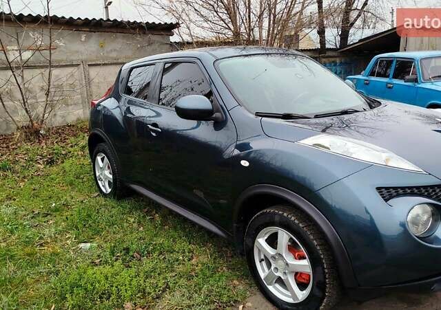 Синій Ніссан Жук, об'ємом двигуна 1.5 л та пробігом 210 тис. км за 8900 $, фото 7 на Automoto.ua