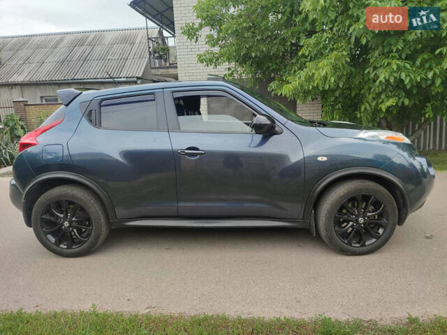 Синий Ниссан Жук, объемом двигателя 1.62 л и пробегом 148 тыс. км за 9700 $, фото 3 на Automoto.ua