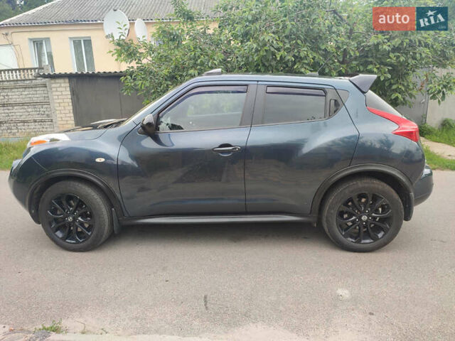 Синий Ниссан Жук, объемом двигателя 1.62 л и пробегом 148 тыс. км за 9700 $, фото 2 на Automoto.ua