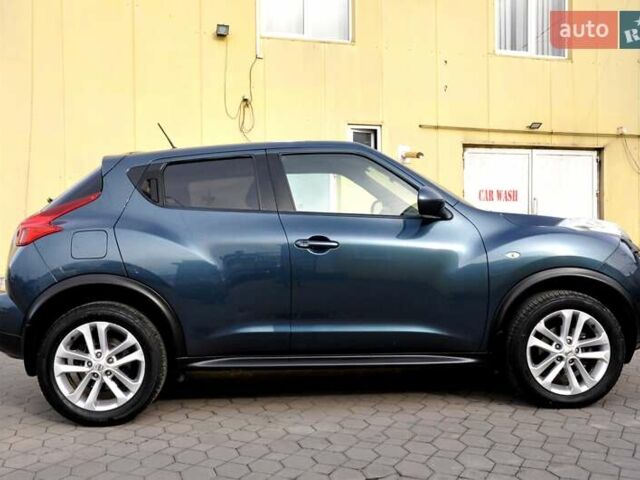 Синій Ніссан Жук, об'ємом двигуна 1.6 л та пробігом 110 тис. км за 8999 $, фото 7 на Automoto.ua