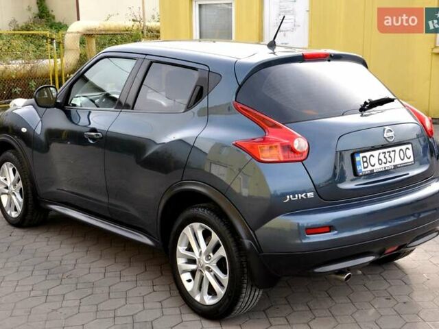 Синій Ніссан Жук, об'ємом двигуна 1.6 л та пробігом 110 тис. км за 8999 $, фото 12 на Automoto.ua