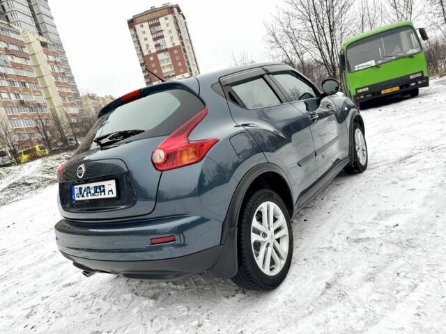 Синий Ниссан Жук, объемом двигателя 1.6 л и пробегом 125 тыс. км за 11490 $, фото 4 на Automoto.ua