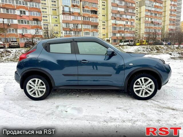 Синий Ниссан Жук, объемом двигателя 1.6 л и пробегом 125 тыс. км за 11490 $, фото 5 на Automoto.ua