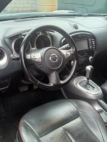 Синий Ниссан Жук, объемом двигателя 1.6 л и пробегом 119 тыс. км за 10750 $, фото 6 на Automoto.ua