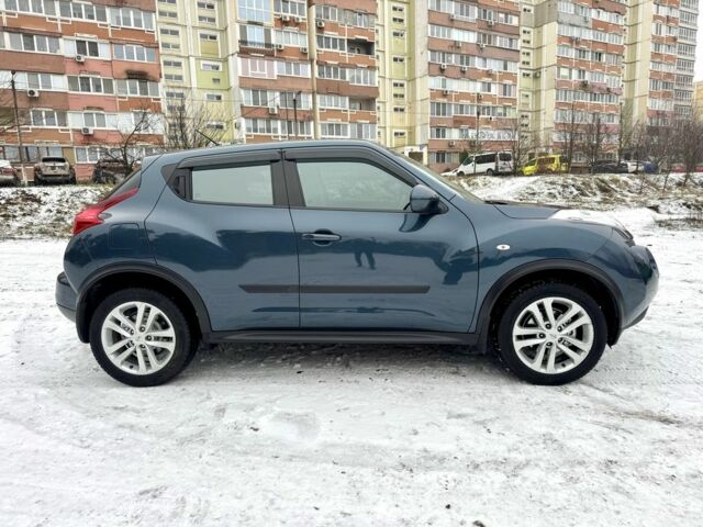 Синий Ниссан Жук, объемом двигателя 1.6 л и пробегом 125 тыс. км за 11490 $, фото 5 на Automoto.ua